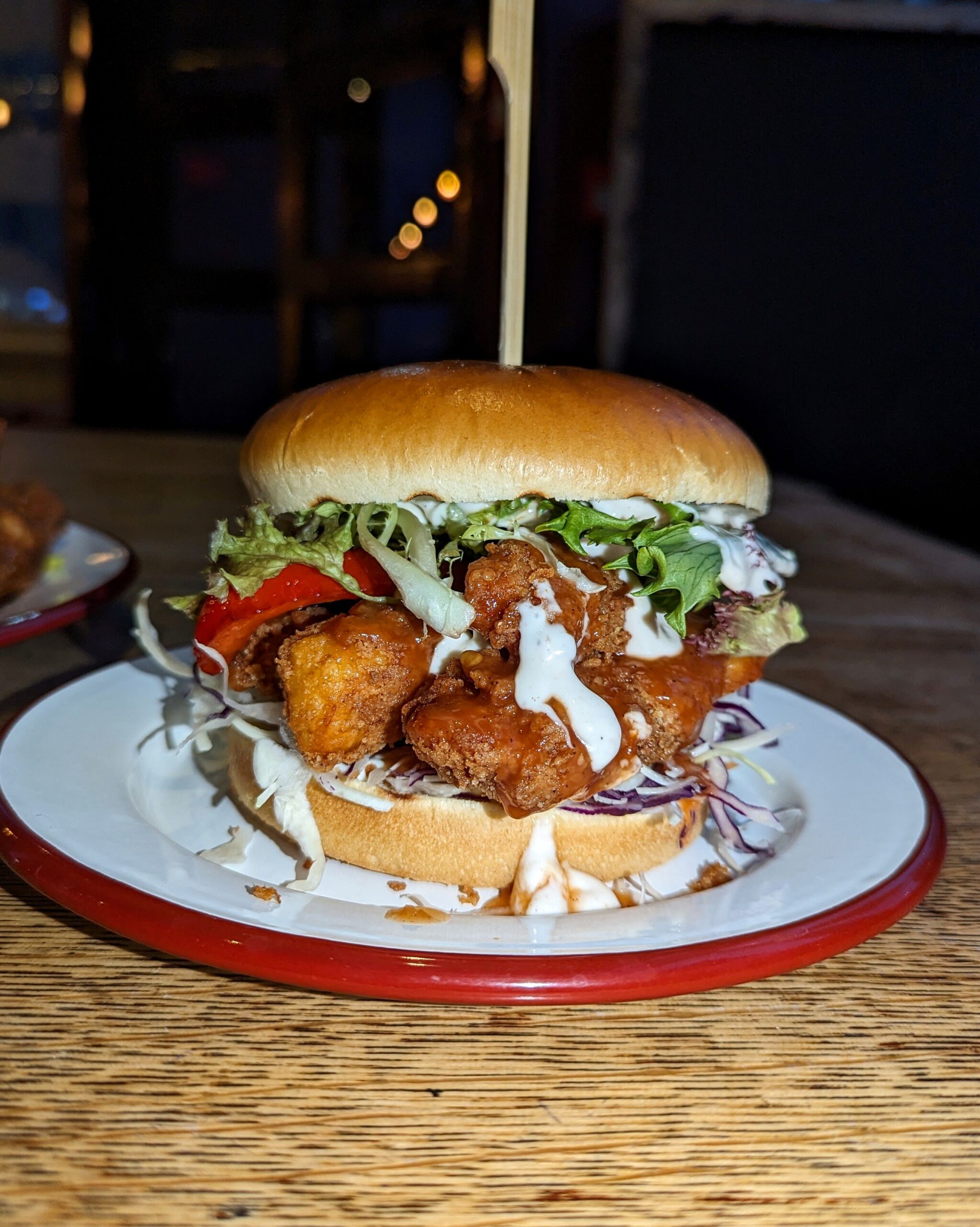 Fried jerk chicken burger